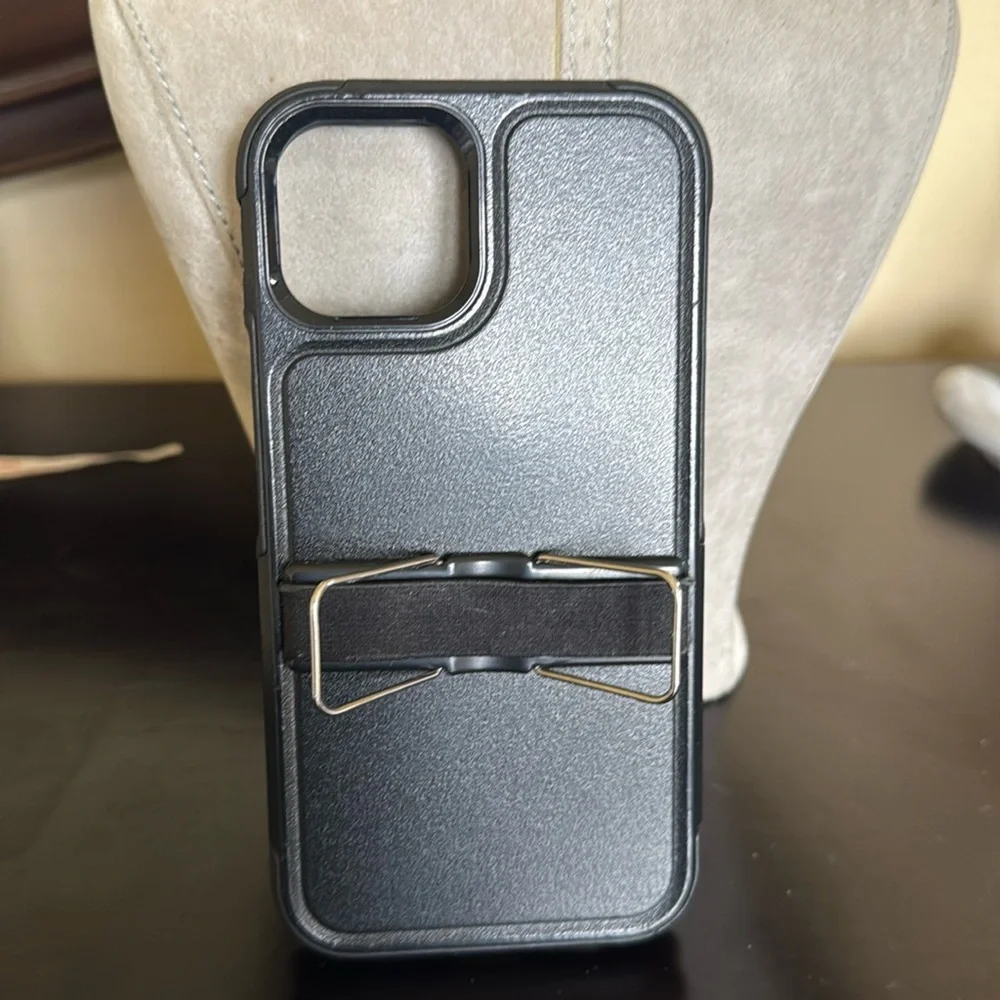 iPhone 13 hardshell case with stand and elastic strap on back
